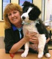 image of Bev with dog she groomed 